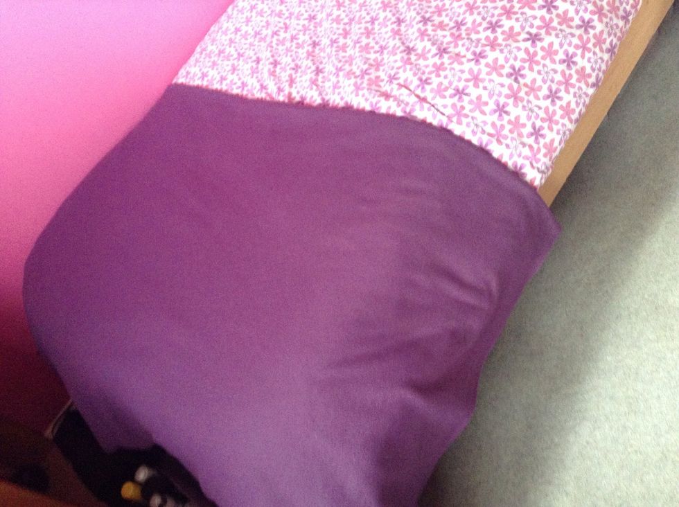 Place on throw to end of bed