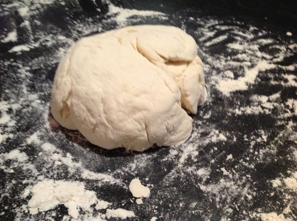 Place on top of flour and kneed