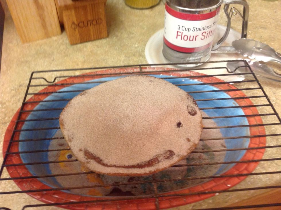 Place on wire rack above deep dish, sprinkle sugar with cinnamon until covered on both sides.
