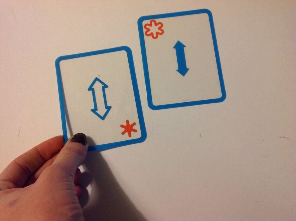 Place one card on the table. Hand the student a second card in a position that requires the student to rotate it to make a match. Ask "Does it match" or "Show me the match."