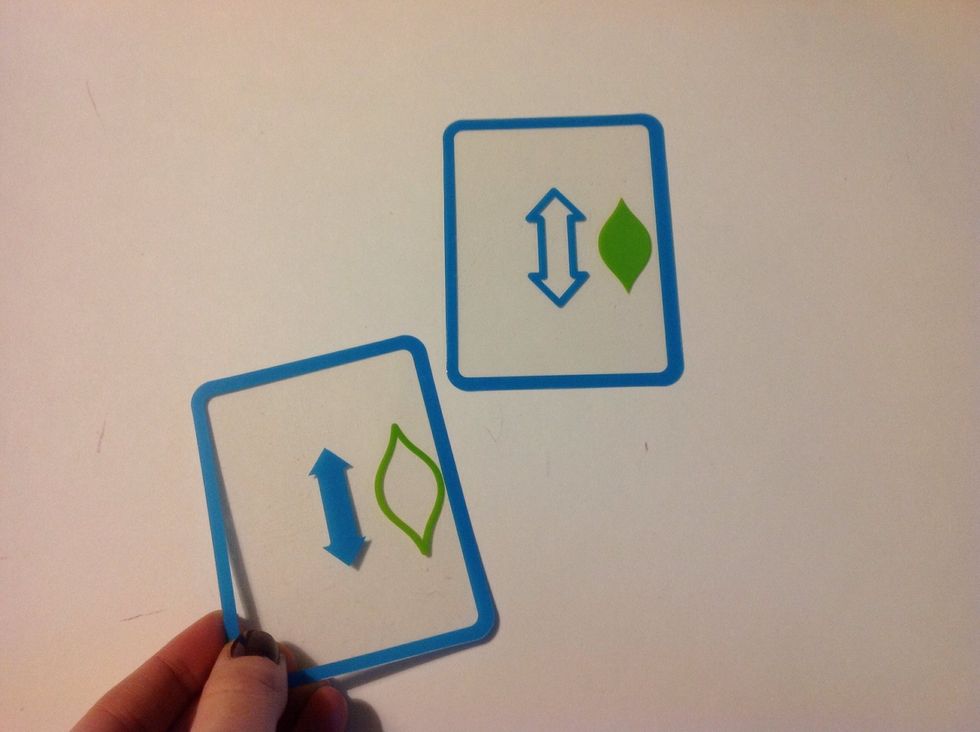 Place one card on the table. Hand the student a second card in the correct position for matching. Ask "Does it match?" or "Show me the match."