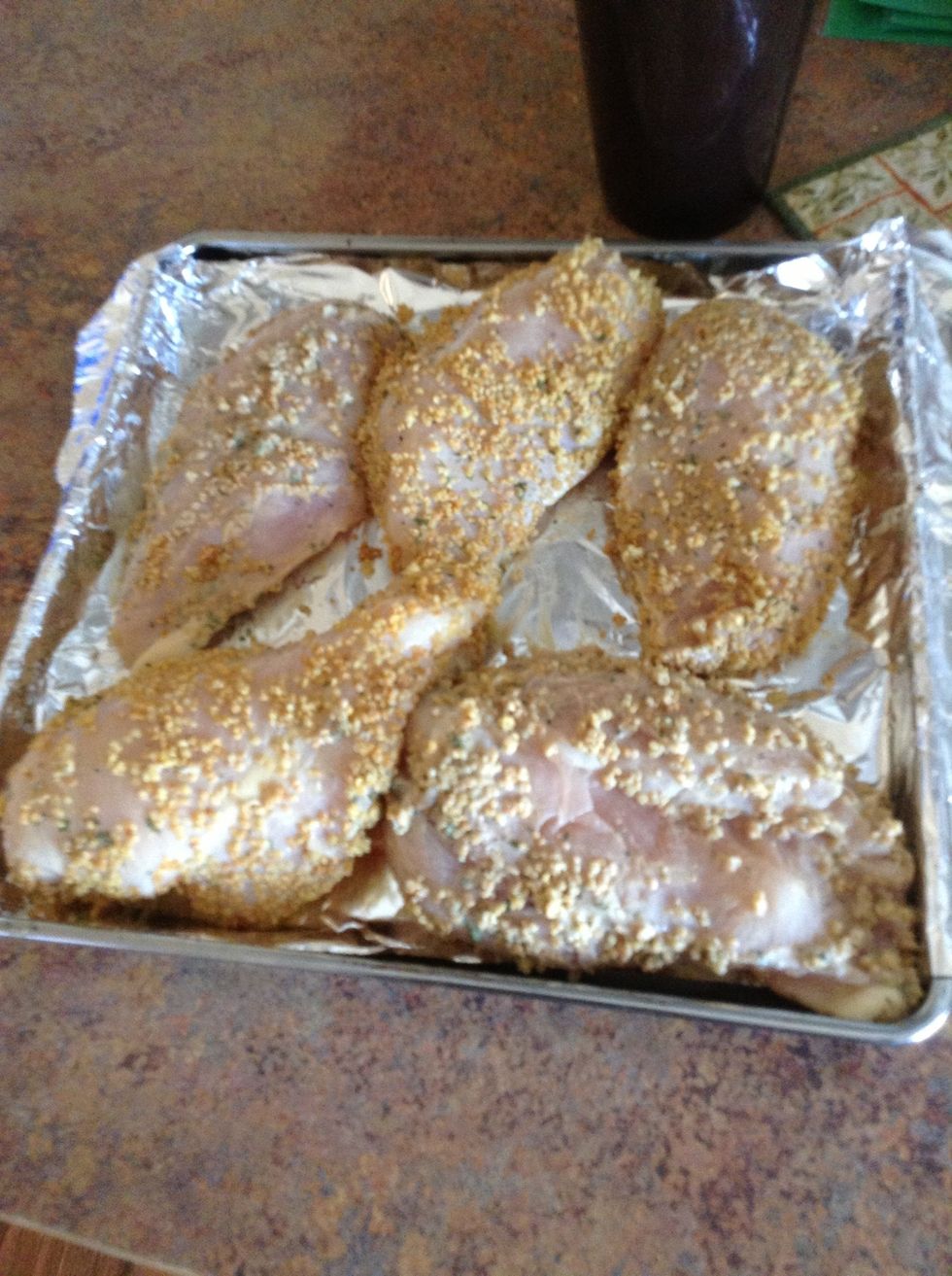 Place one chicken breast at a time into Tupperware