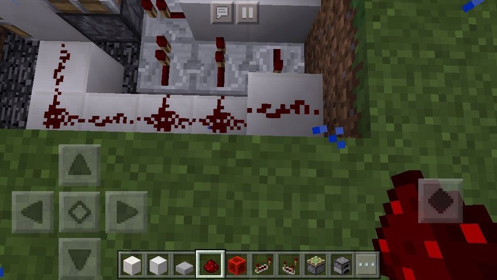 Place one more redstone as shown.