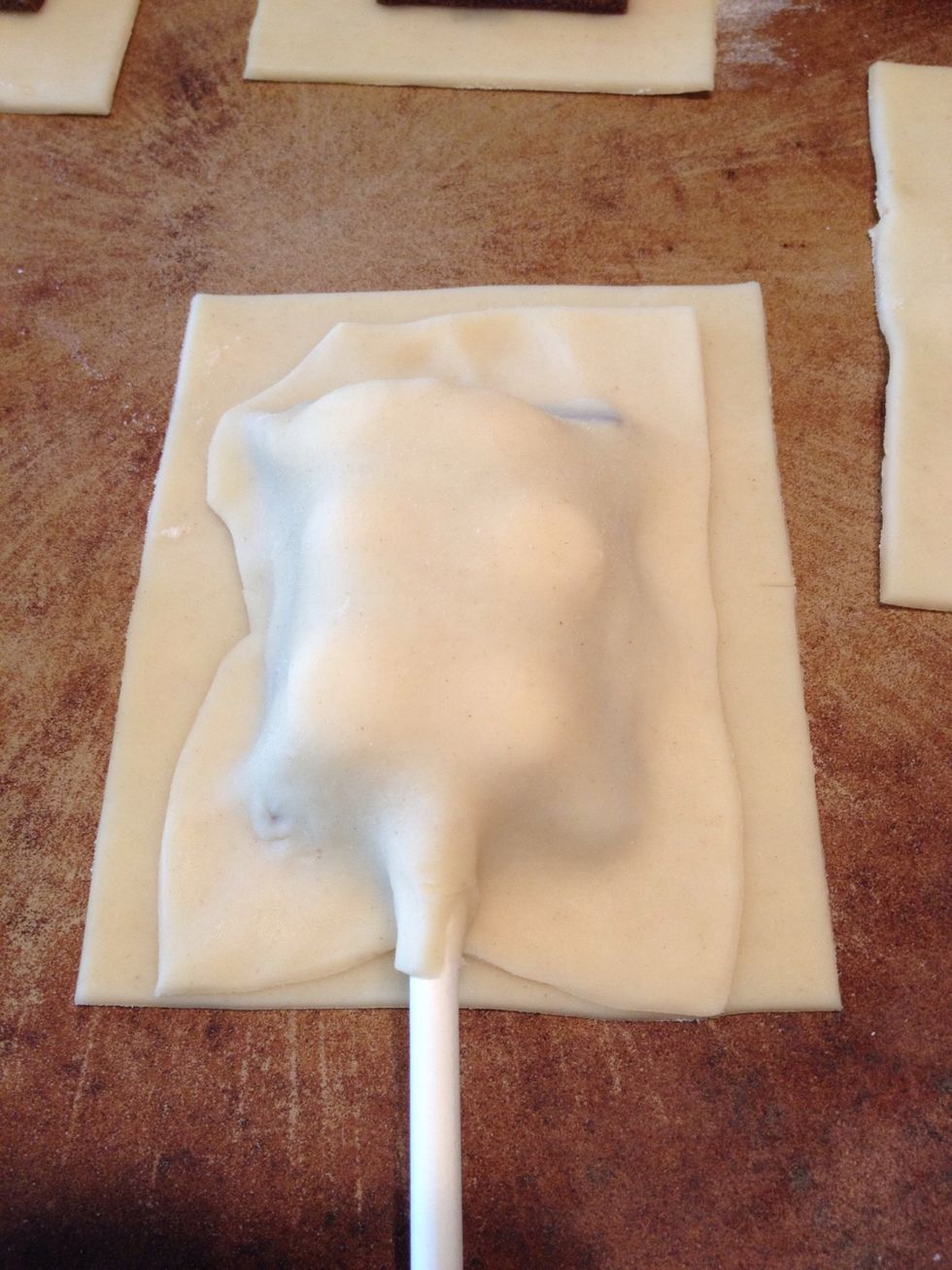 Place one rectangle on top of a s'more.  Press along the sides to seal the dough.