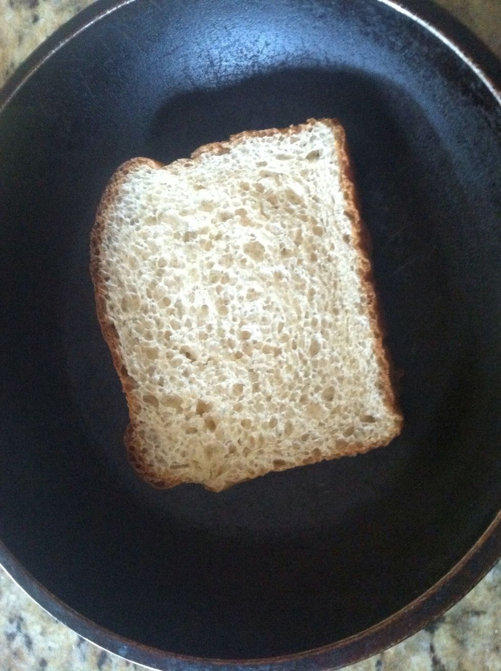 Place one slice butter side down in a pan