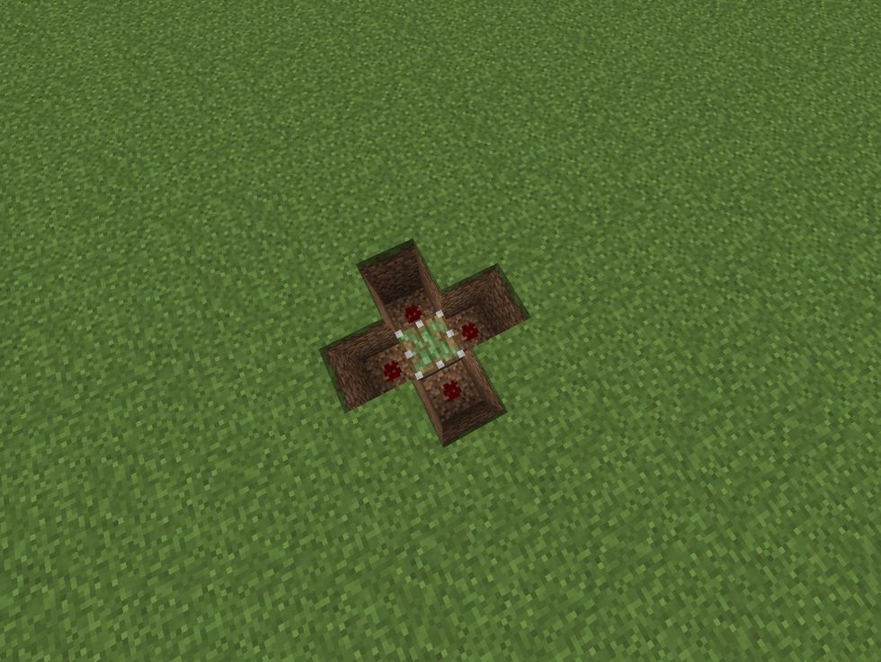 Place one sticky piston and surround it with four redstone.