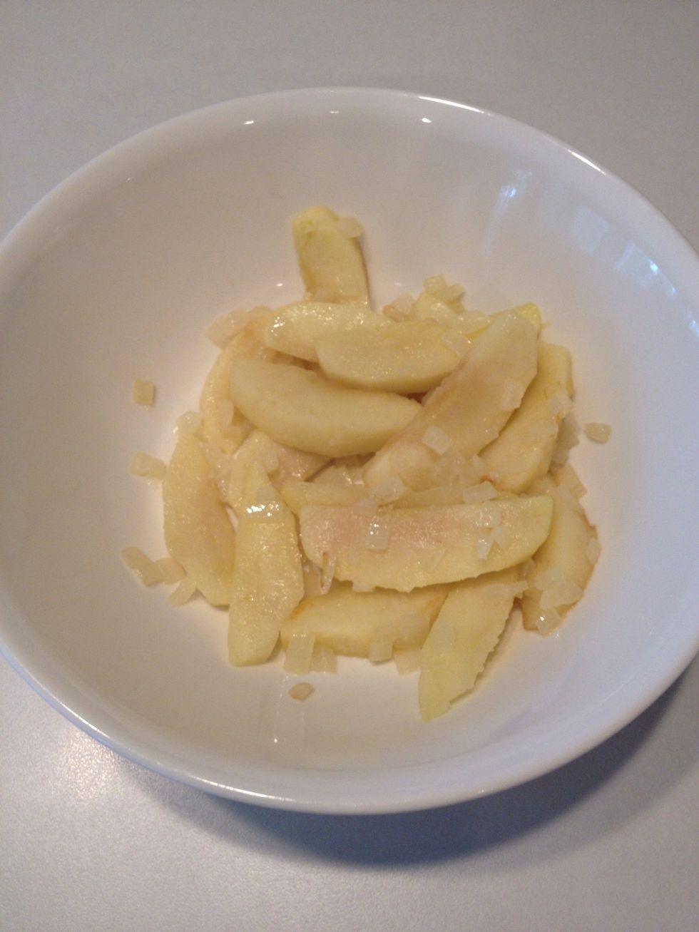 Place onions and apples in a separate bowl and set aside.