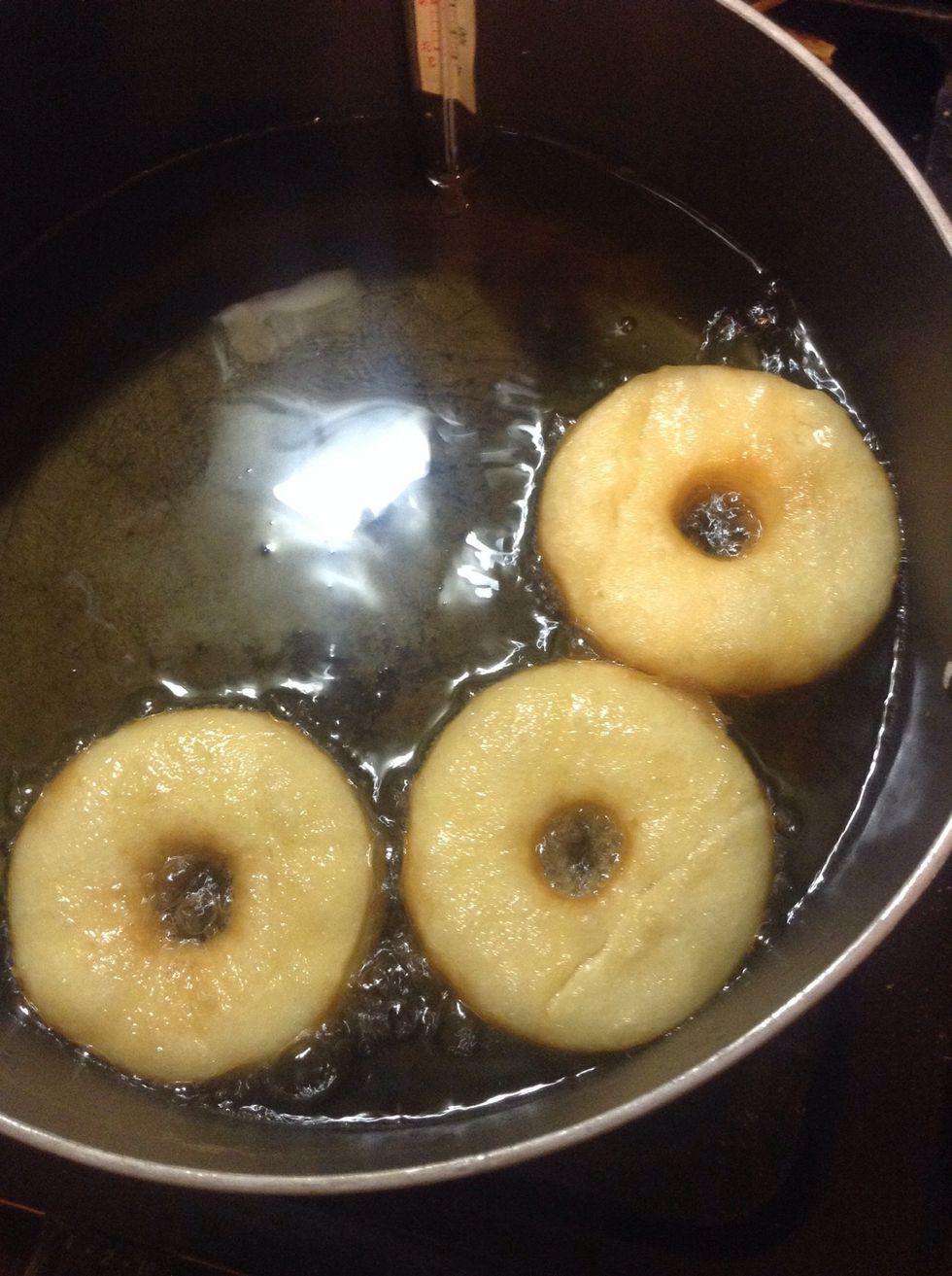 Place only three Cronuts in the hot oil at a time. You do not want to crowd them because the will begin to expand, especially when you flip them.