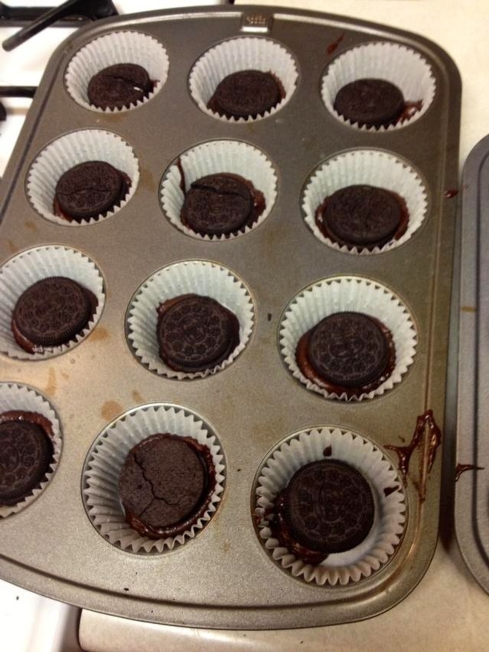 Place Oreo ontop of brownie mix.