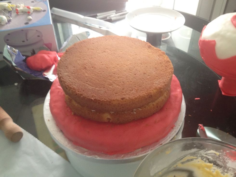 Place other 6" cake on top