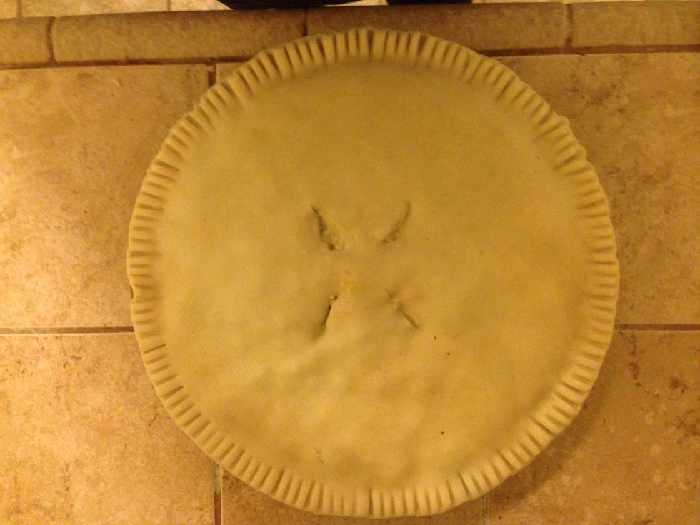 Place other crust on top and pleat the edges with a fork.