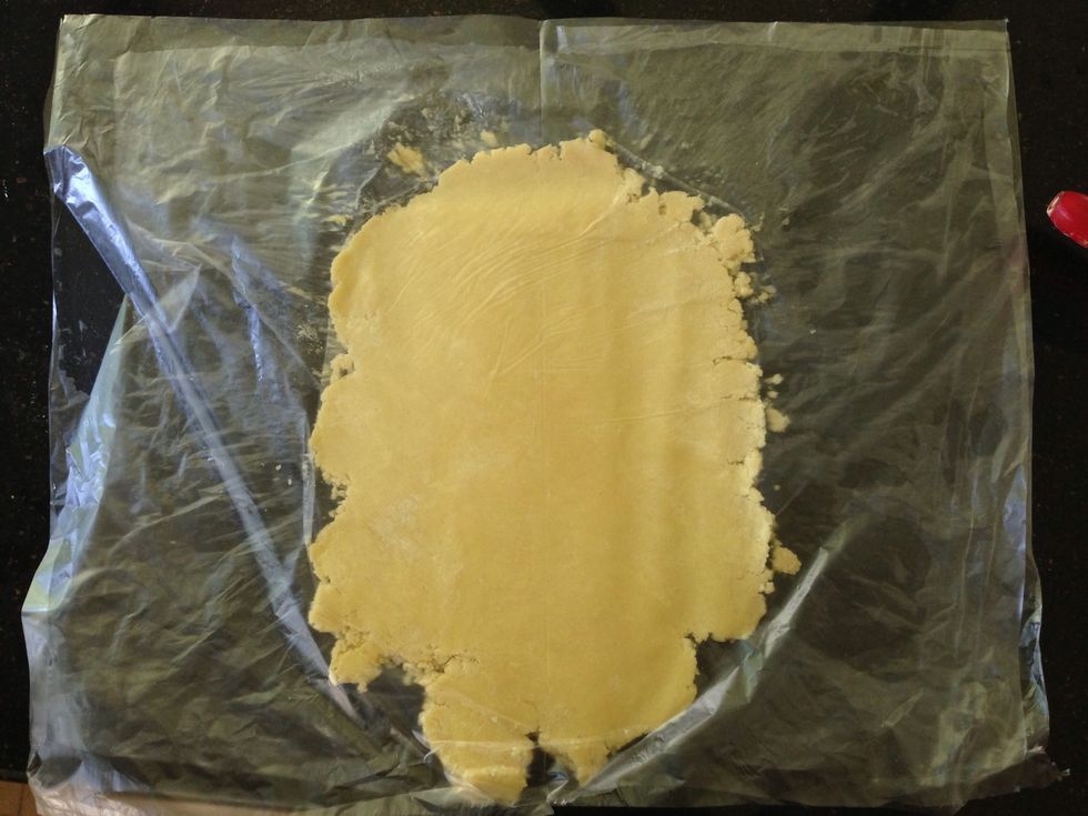 Place other freezer bag over the top so the pastry's covered on both sides. Working quickly, roll it out to about 4mm thick