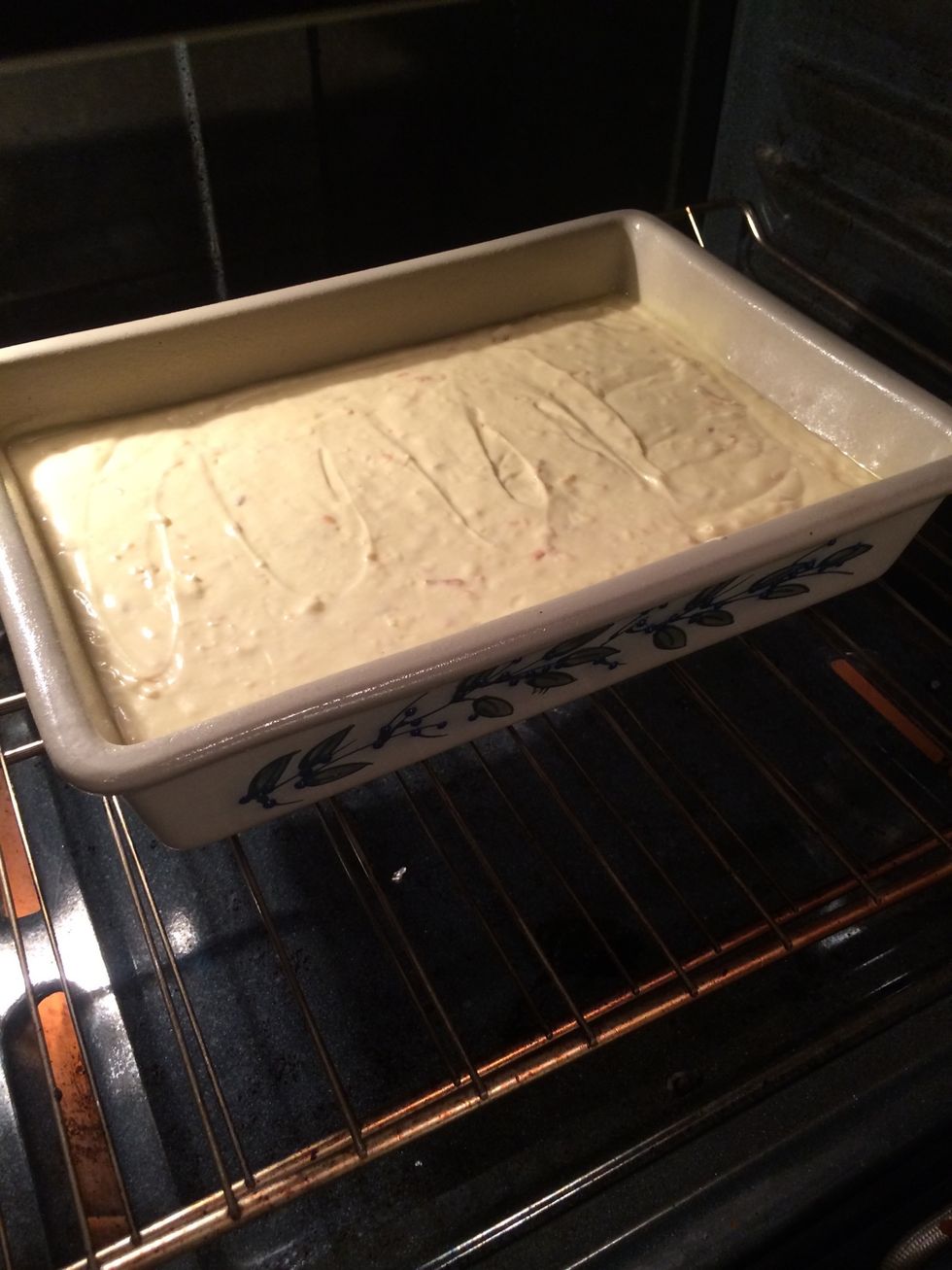 Place pan in lower 1/3 center of a 350f oven and bake 50-65minutes. Test for doneness by testing with a toothpick. Stick cake with a clean toothpick. If the toothpick come out clean, the cake is done.