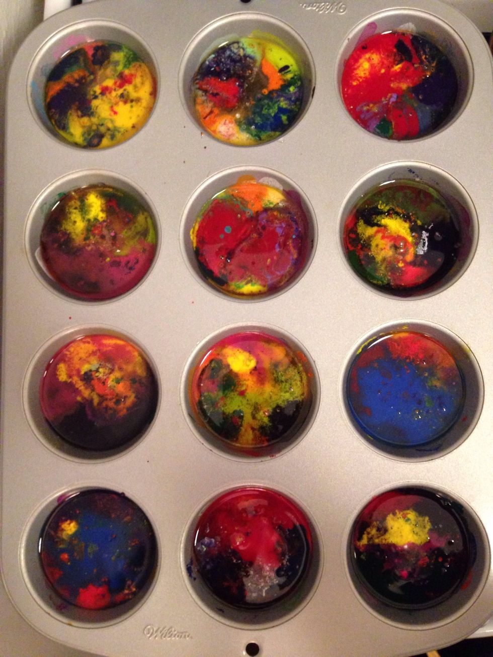 Place pans in preheated oven for 10-15 minutes or until the crayons have melted completely. Remove from oven and let cool COMPLETELY.