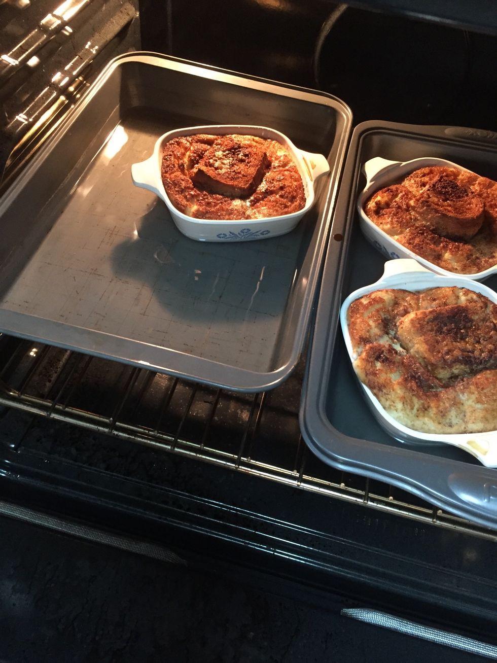 Place pans of hot water holding baking dish(s) into preheated 350\u00b0 oven.