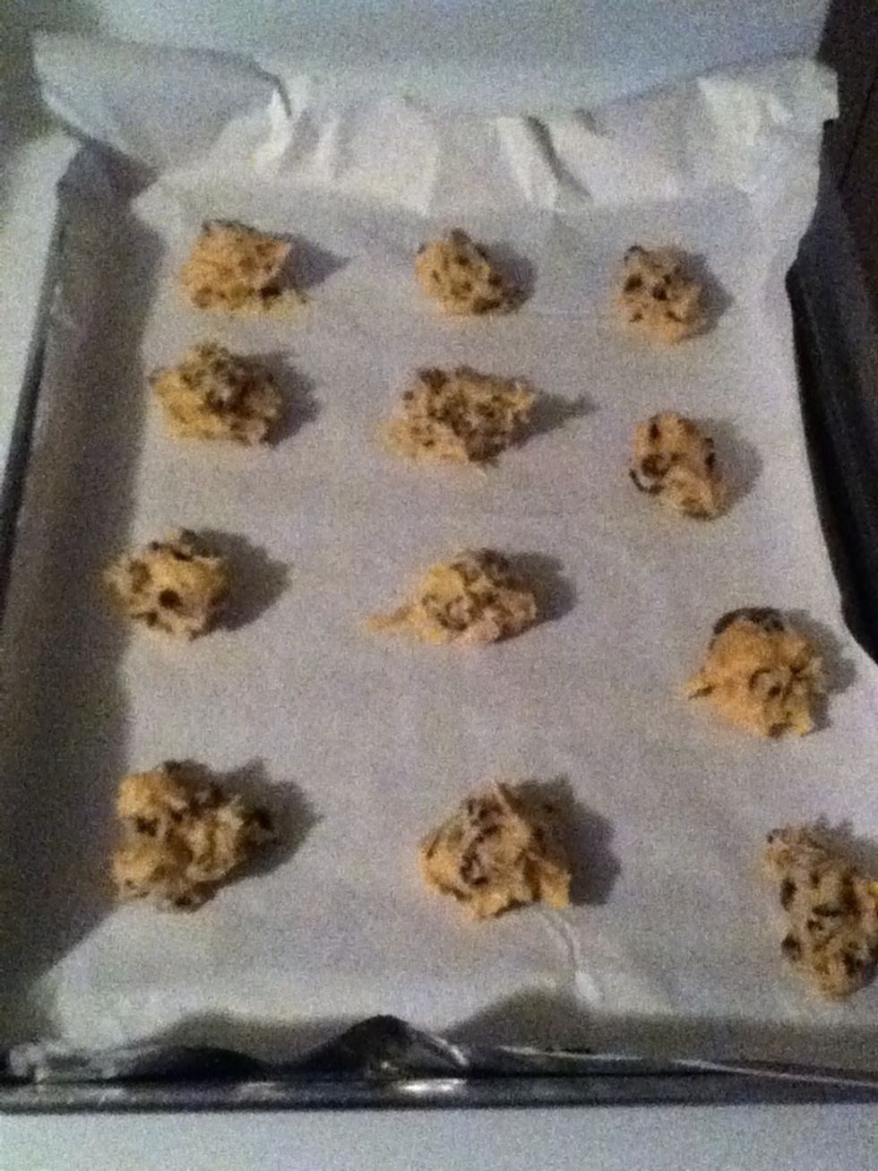 Place parchment paper on a baking sheet. Put  chunks of the dough on the paper, in teaspoon sizes.