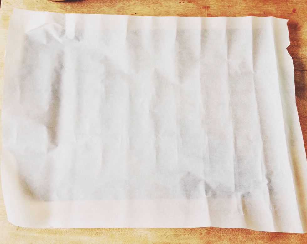 Place parchment paper on cookie sheet and preheat oven to 400 degrees.