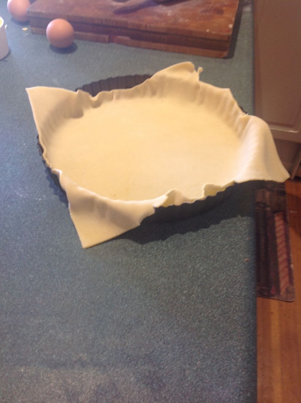 Place pastry in quiche dish