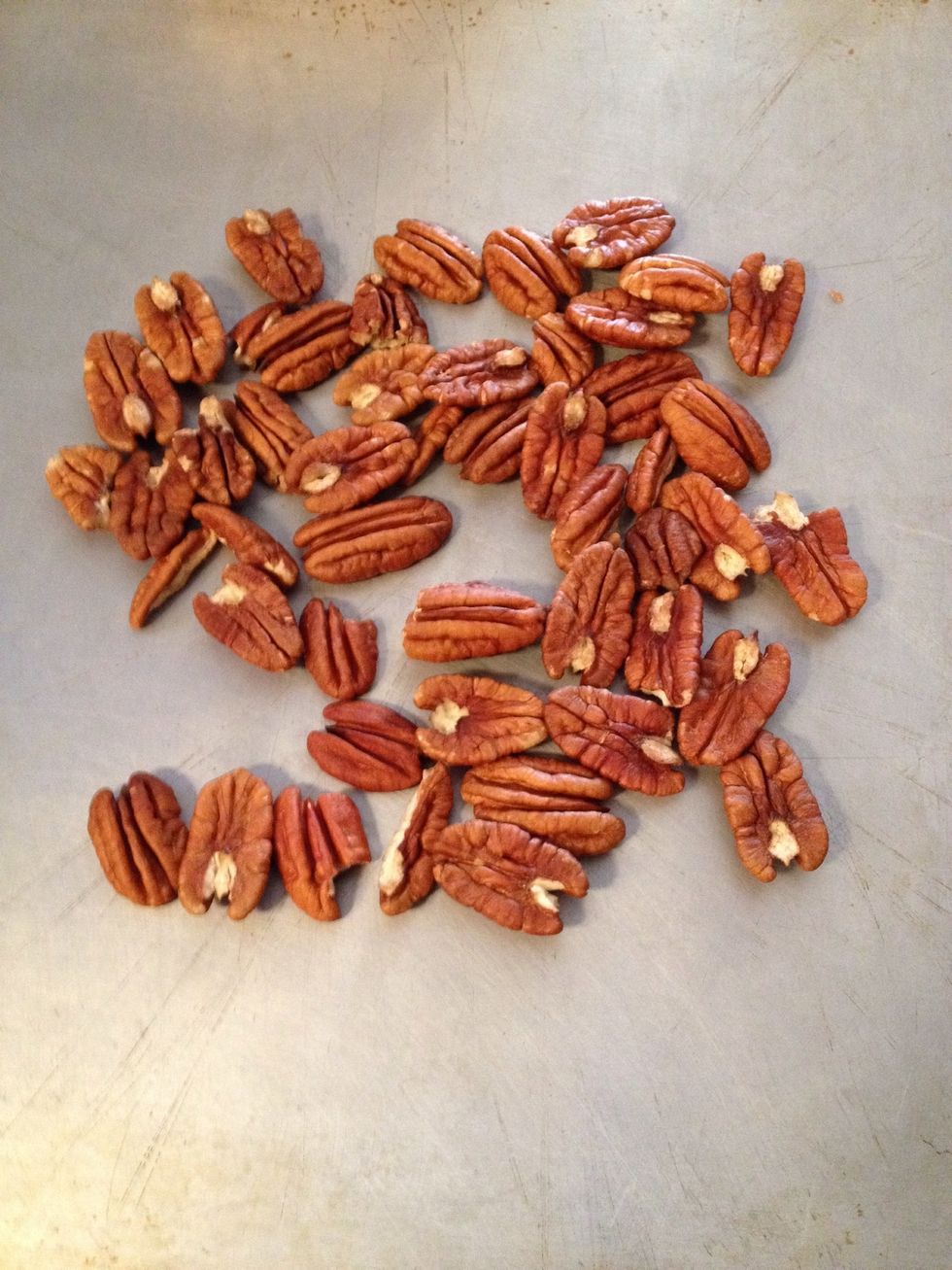 Place pecans one cookie sheet and bake them stirring occasionally for about seven minutes.
