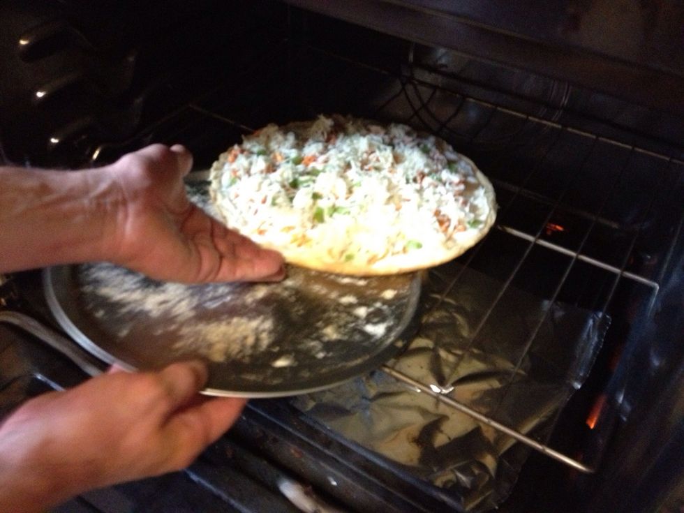 Place pizza on rack. Cook for 10 minutes.
