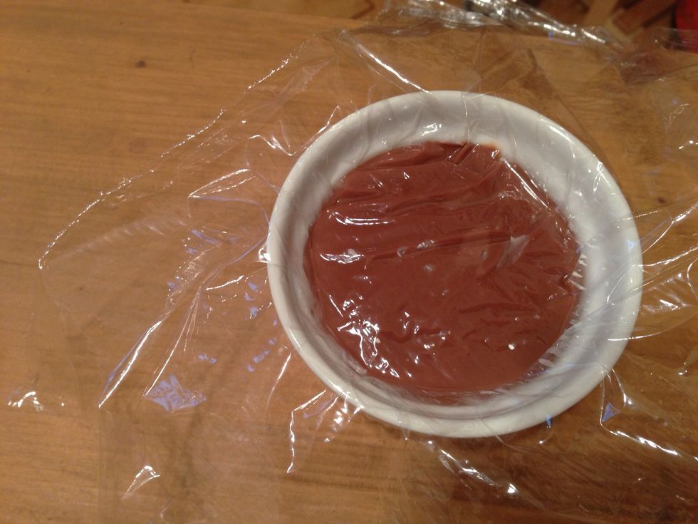 Place plastic wrap on top of the pudding and smooth it gently against the surface for refrigeration.