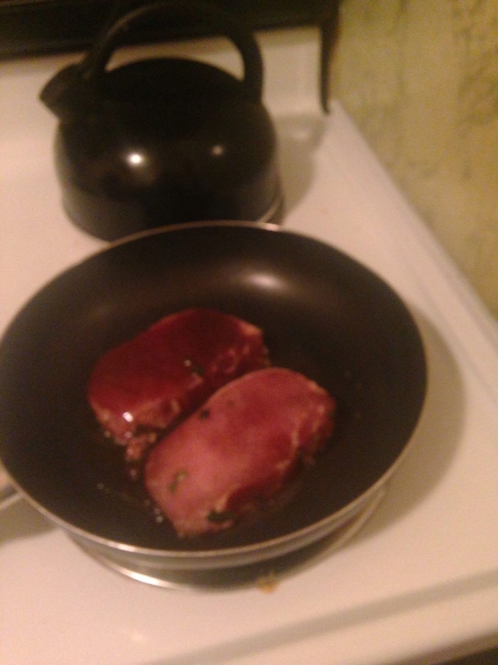 Place pork chops in pan.