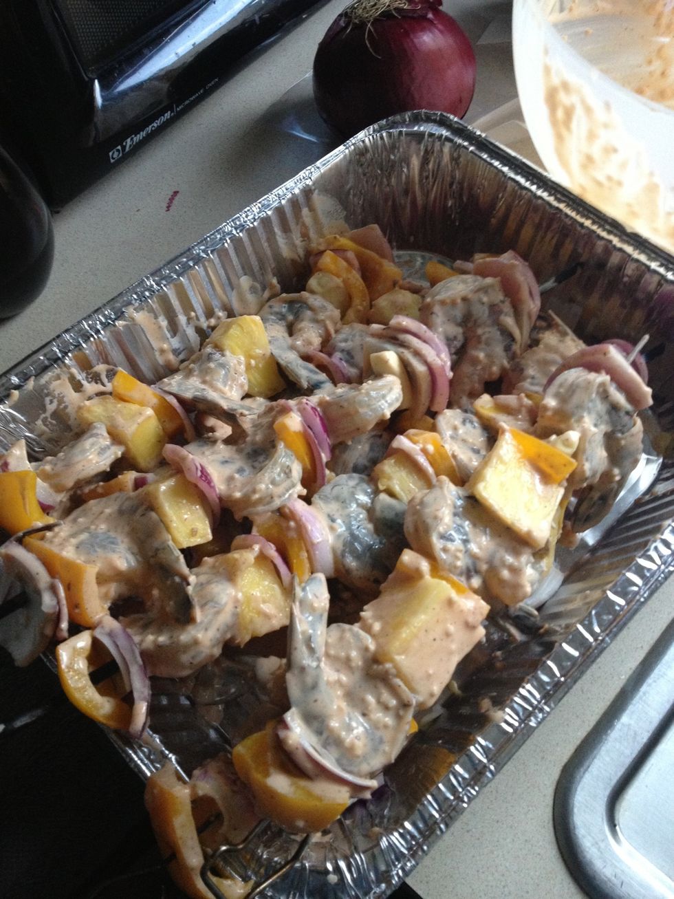 Place prawns, pineapple, and vegetables on skewers in alternating pattern...make it pretty. Place skewers in smoker