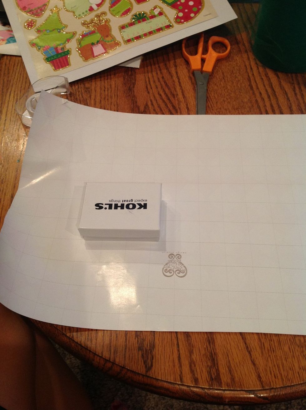 place present in the middle of the wrapping paper