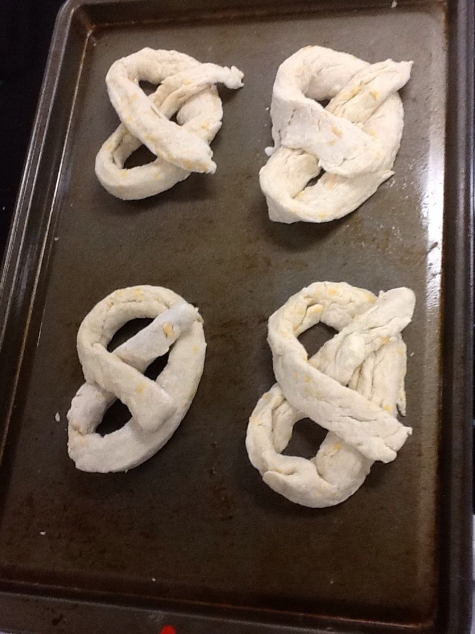 Place pretzels on cookie sheet