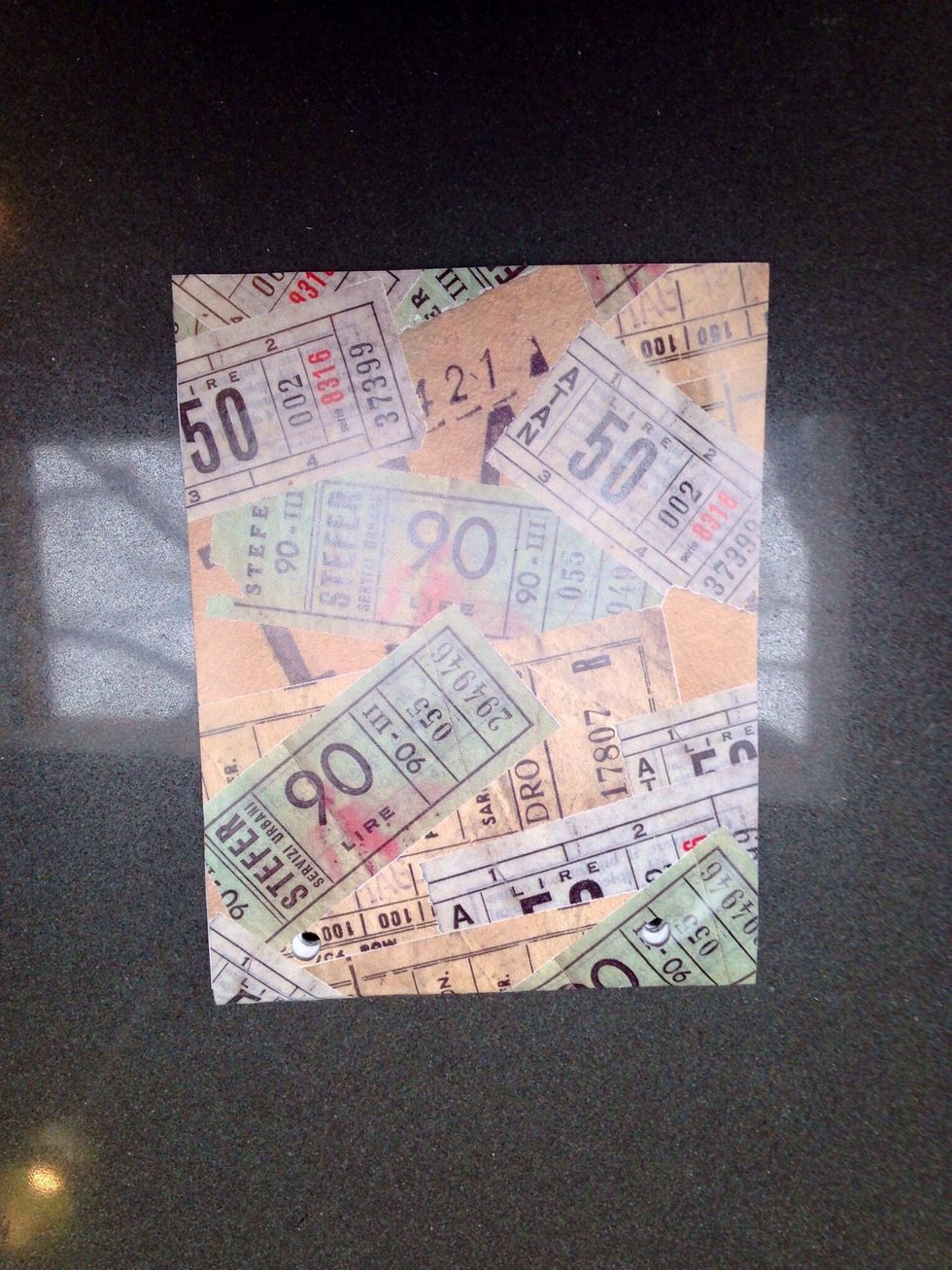 Place punched papers in covers and line up holes.