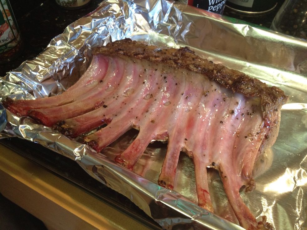 Place rack in baking pan to prepare for following steps.
