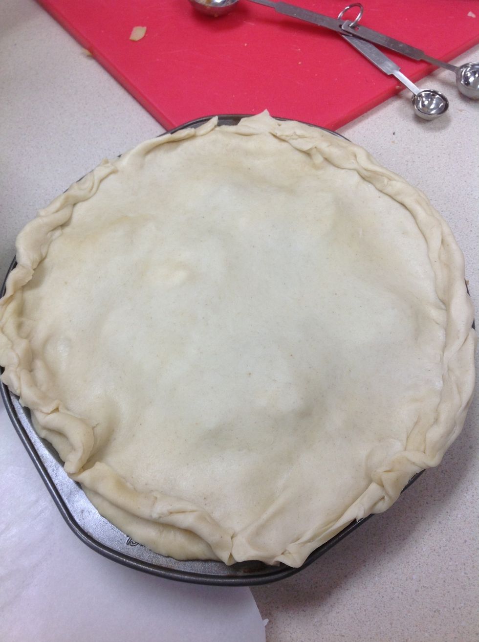 Place remaining dough over top of crust