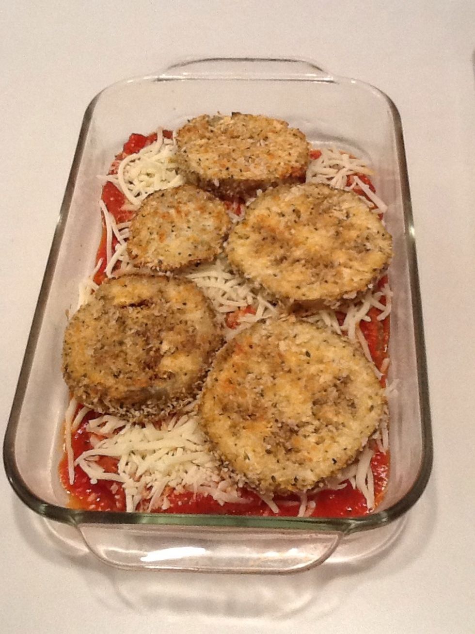 Place remaining eggplant slices on top of cheese.