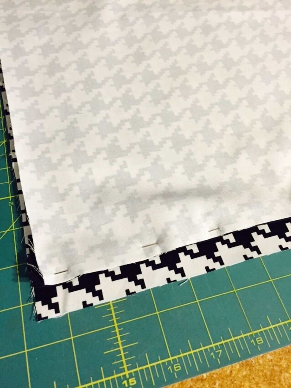 Place remaining piece of fabric right side up with pinned zipper fabric face down on top of it.