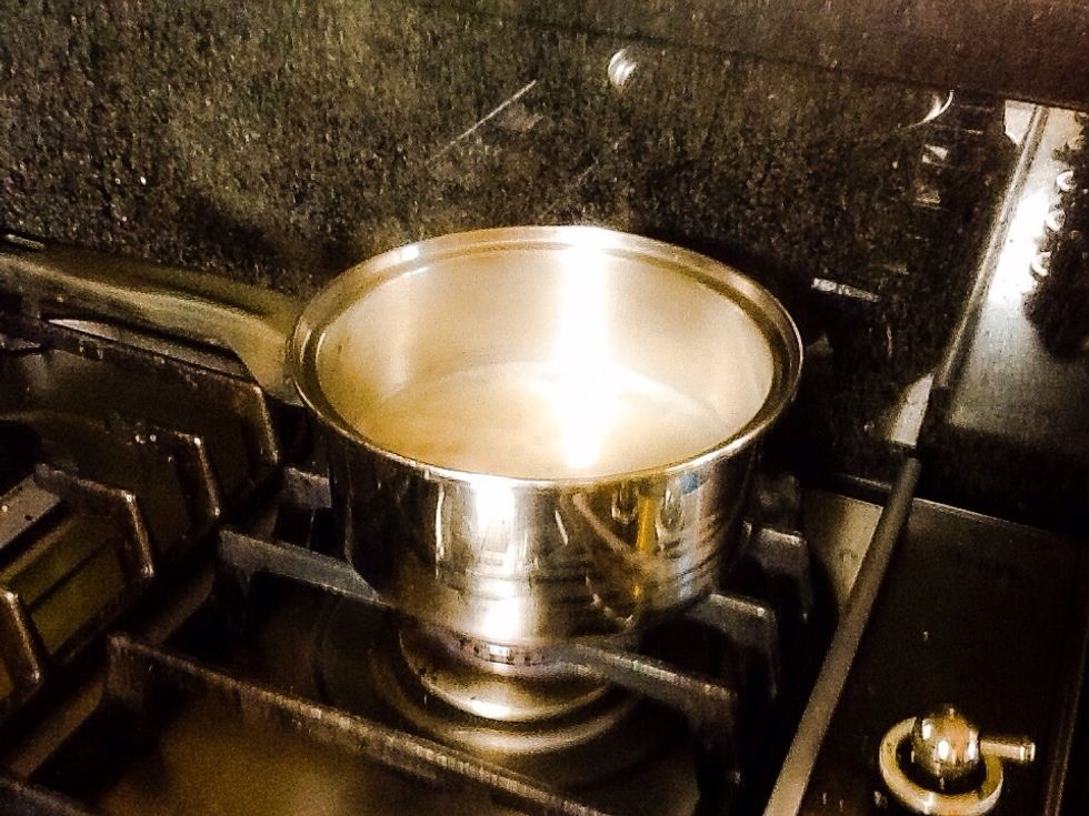 Place rice in saucepan with 1 cup of water
