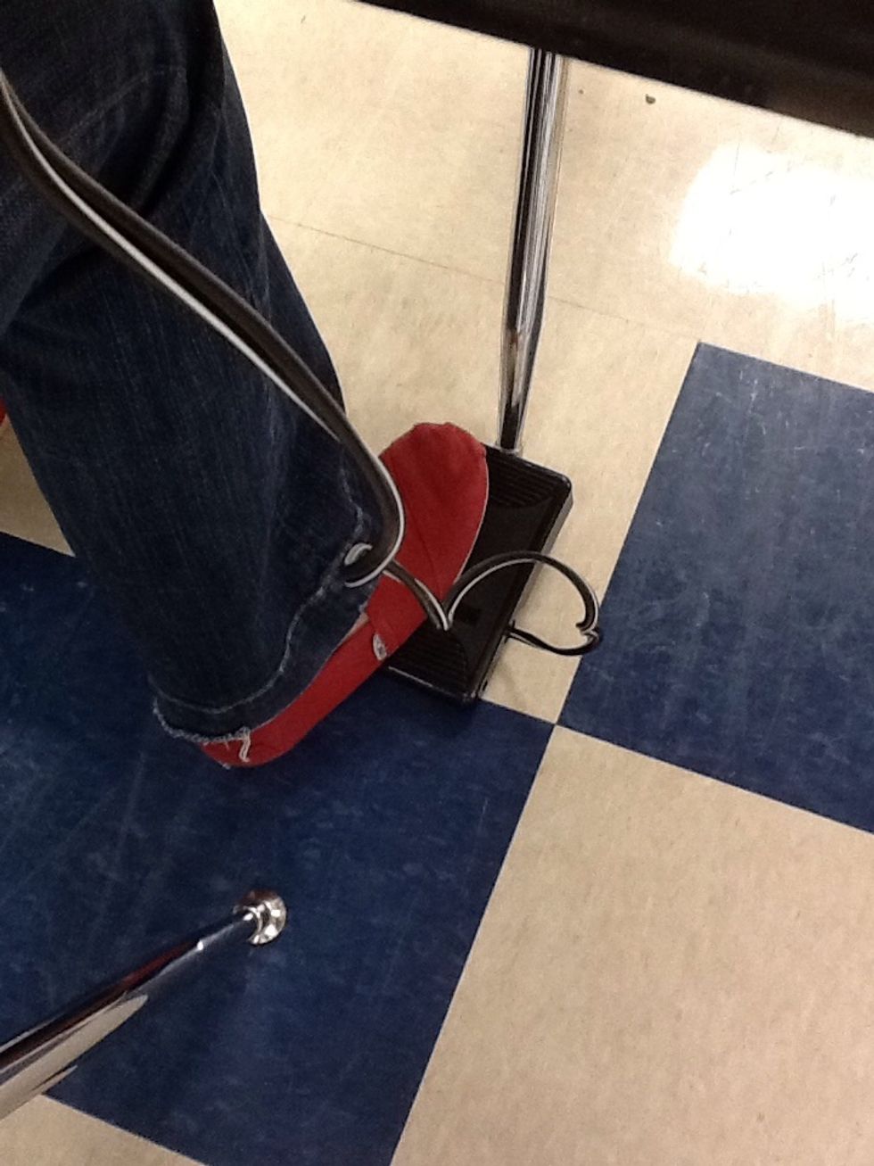Place right foot on the foot pedal