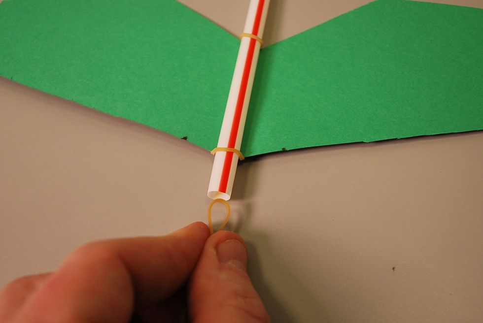 Place rubber band for launching into the other end (the front) and staple it in place