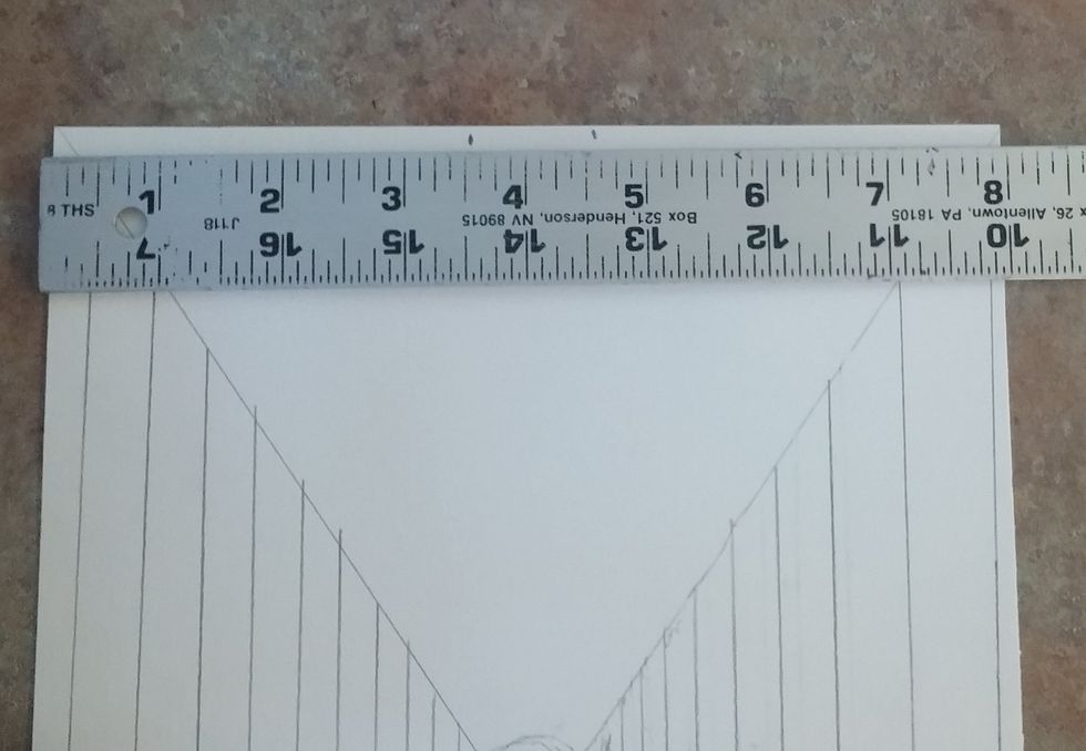 Place ruler at top of paper. make a mark at 3 1/2 inches and 4 1/2 inches