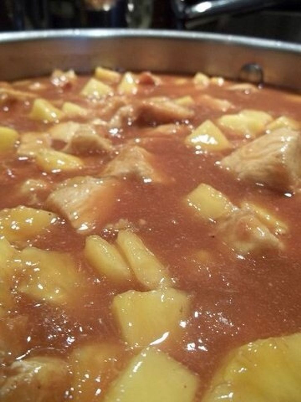 Place sauce into the large skillet where the chicken was. Allow this to cook on a simmer for about 15 minutes it just allows chicken to marinade in the pineapple sauce.