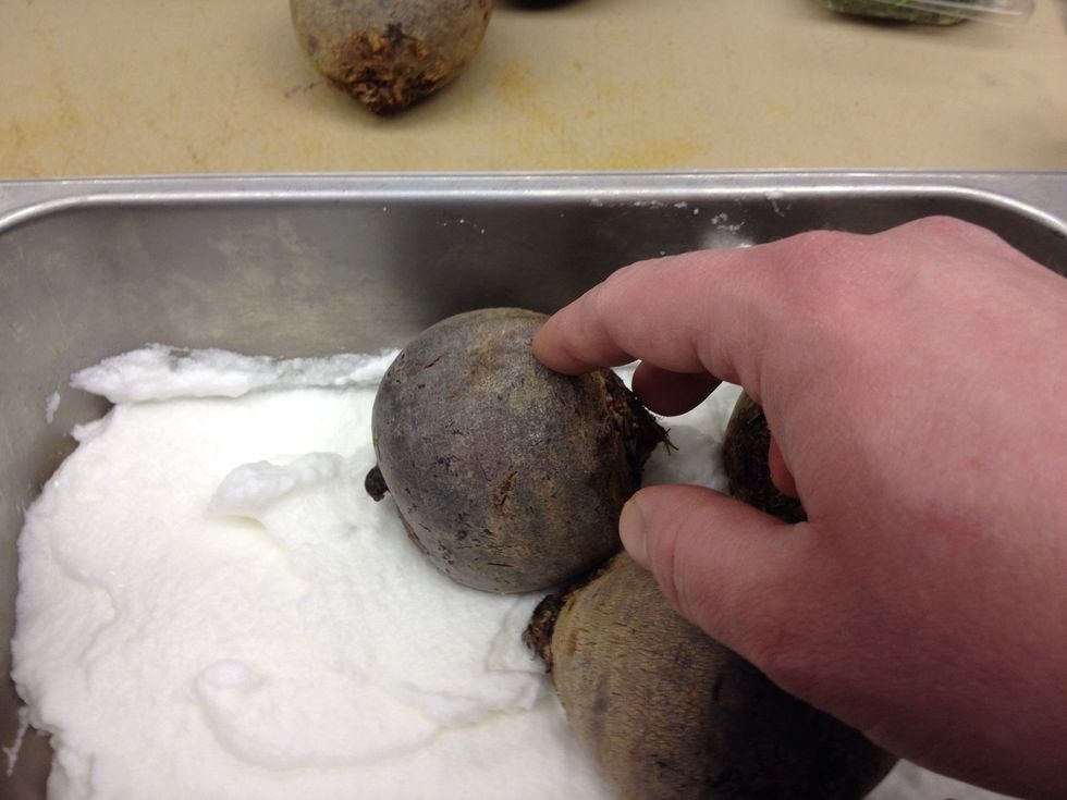 Place scrubbed beets onto egg whites.