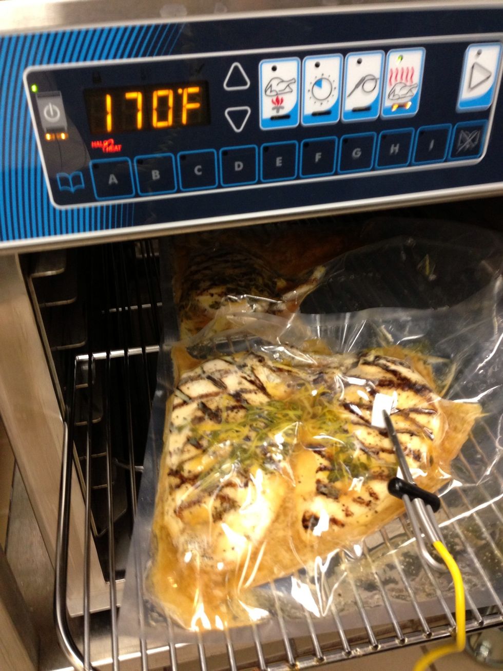 Place sealed chicken into oven with an outside probe and bring internal temp. to 155F (68C).