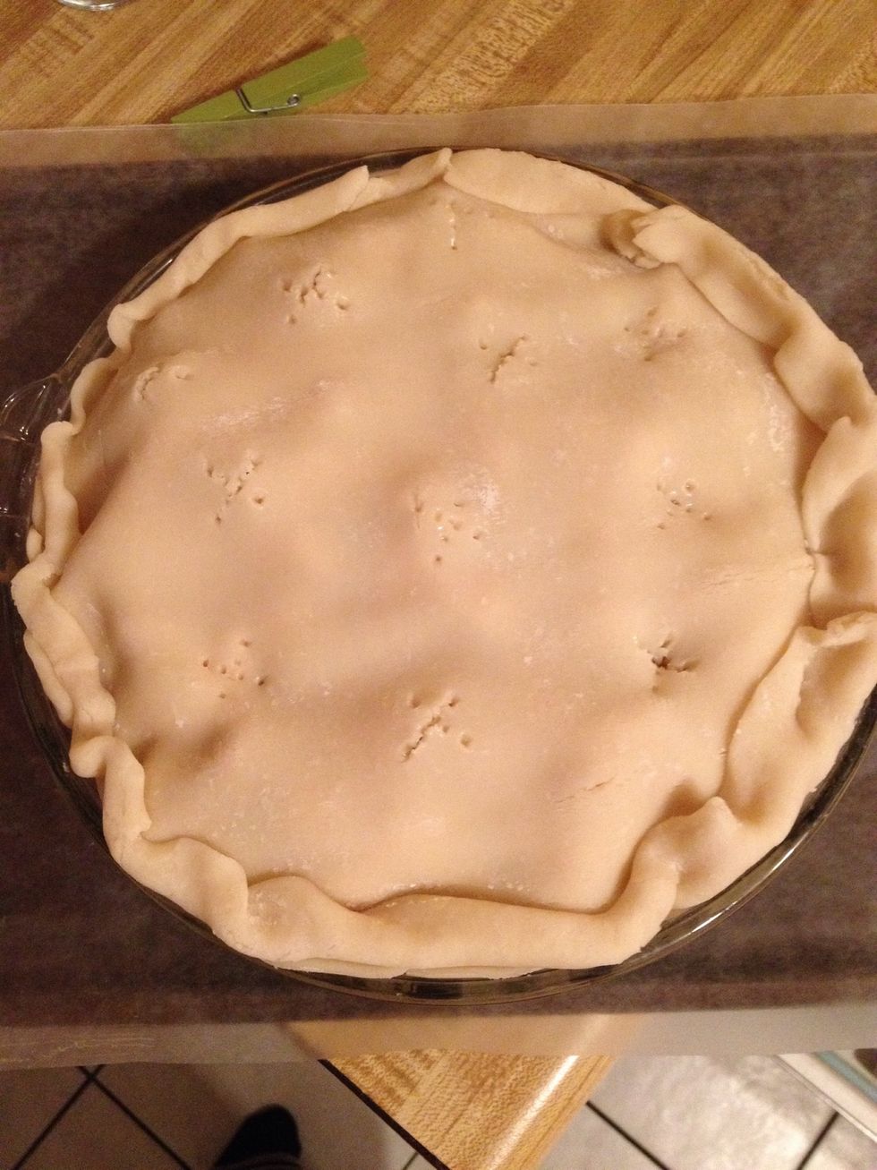 Place second crust on top. Make sure to make holes in top to allow steam to escape! Place on cookie sheet to catch any possible drips. Cook at 375 for about 45-55 minutes.