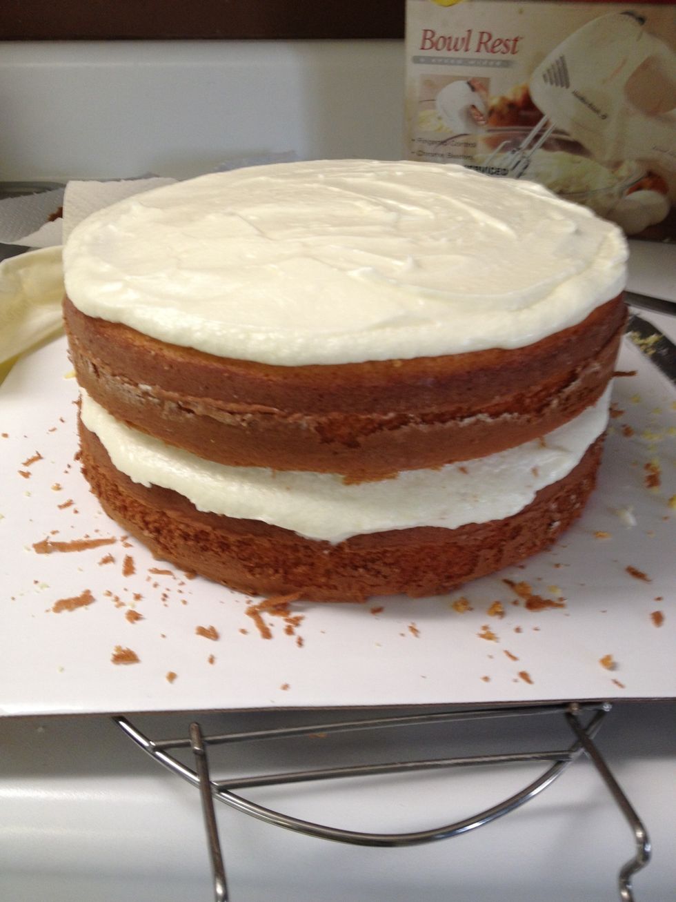 Place second layer on top; ice top.