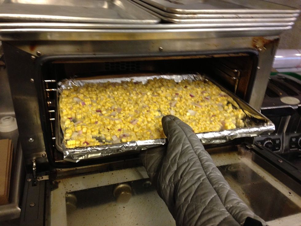 Place sheet of corn in oven for 13-17 mins. Check the kernels and make sure they have a nice deep golden color.