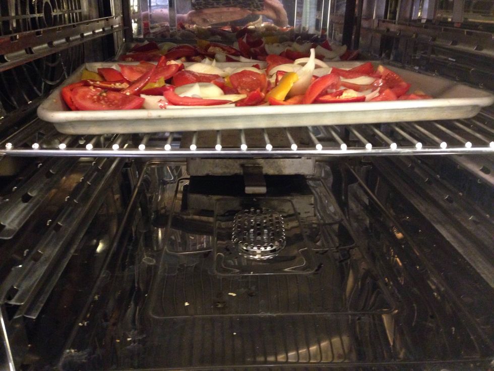 Place sheet trays into the combi oven above the smoker box.