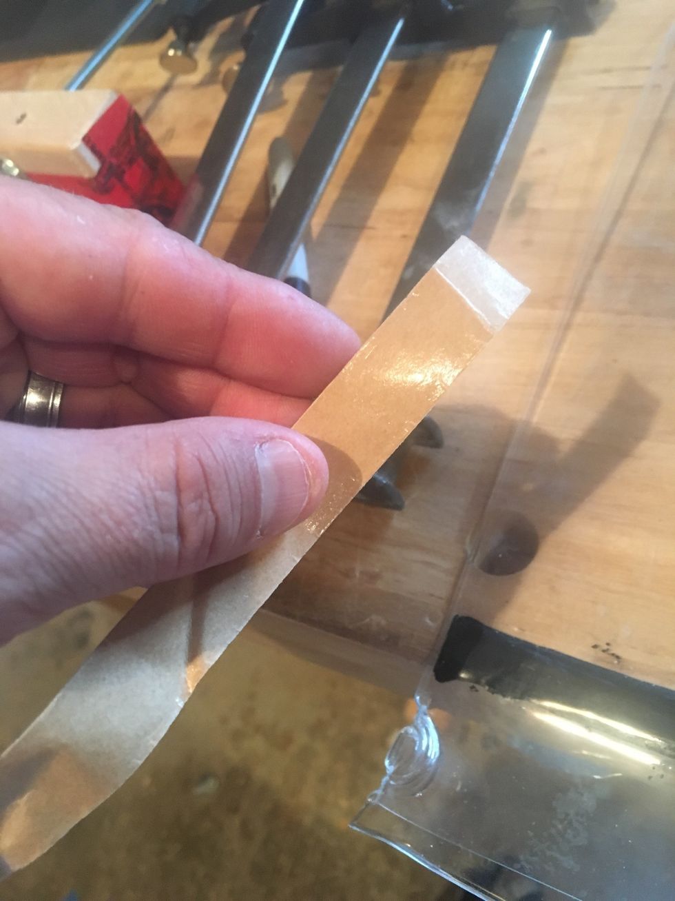 place shine side of sealing tape cover on sealing tape.