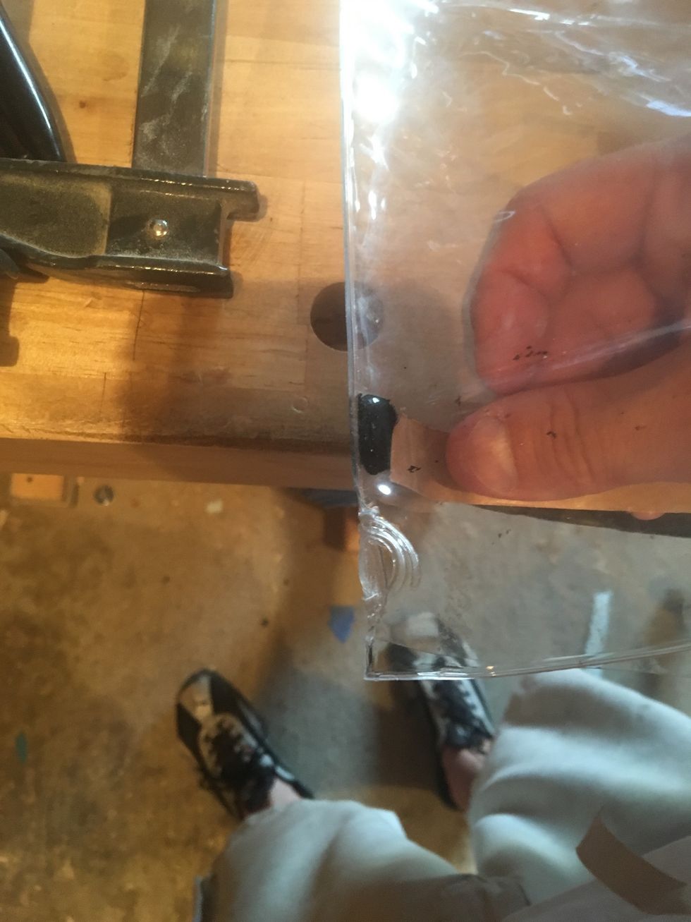 Place shiny side of sealing tape cover on sealing tape.