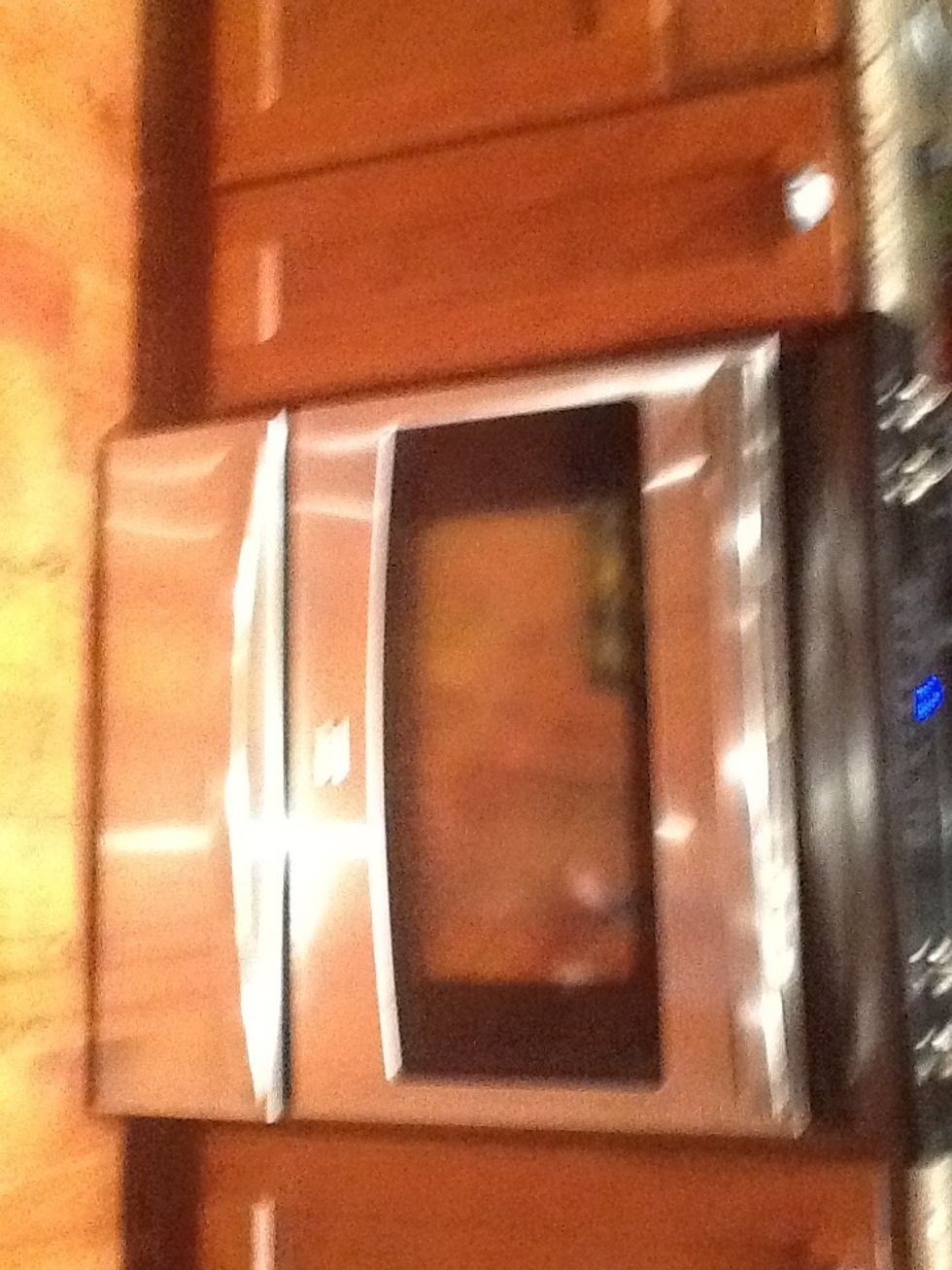 Place Shrinky Dink on the paper bag and bake for 4 minutes.