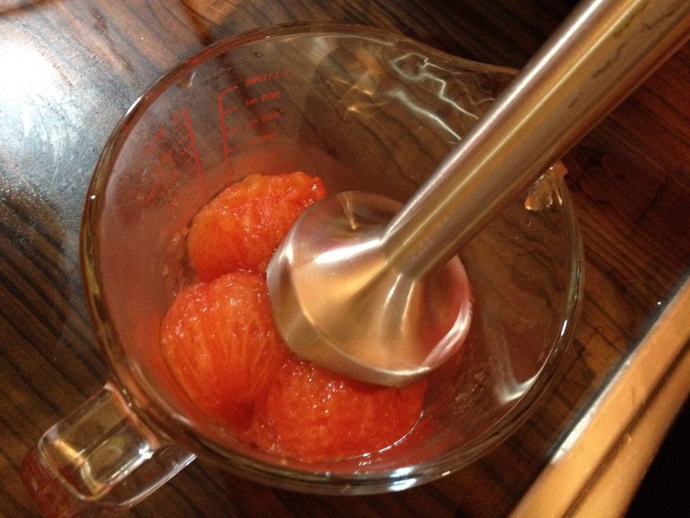 Place skinless tomatoes in a jug and puree using hand blender