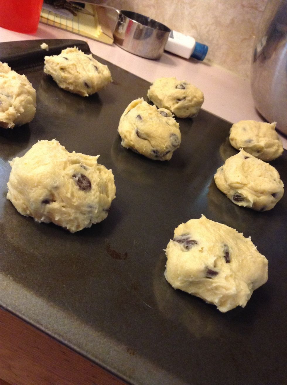Place small amounts of dough into ball and put then on a ungreased pan